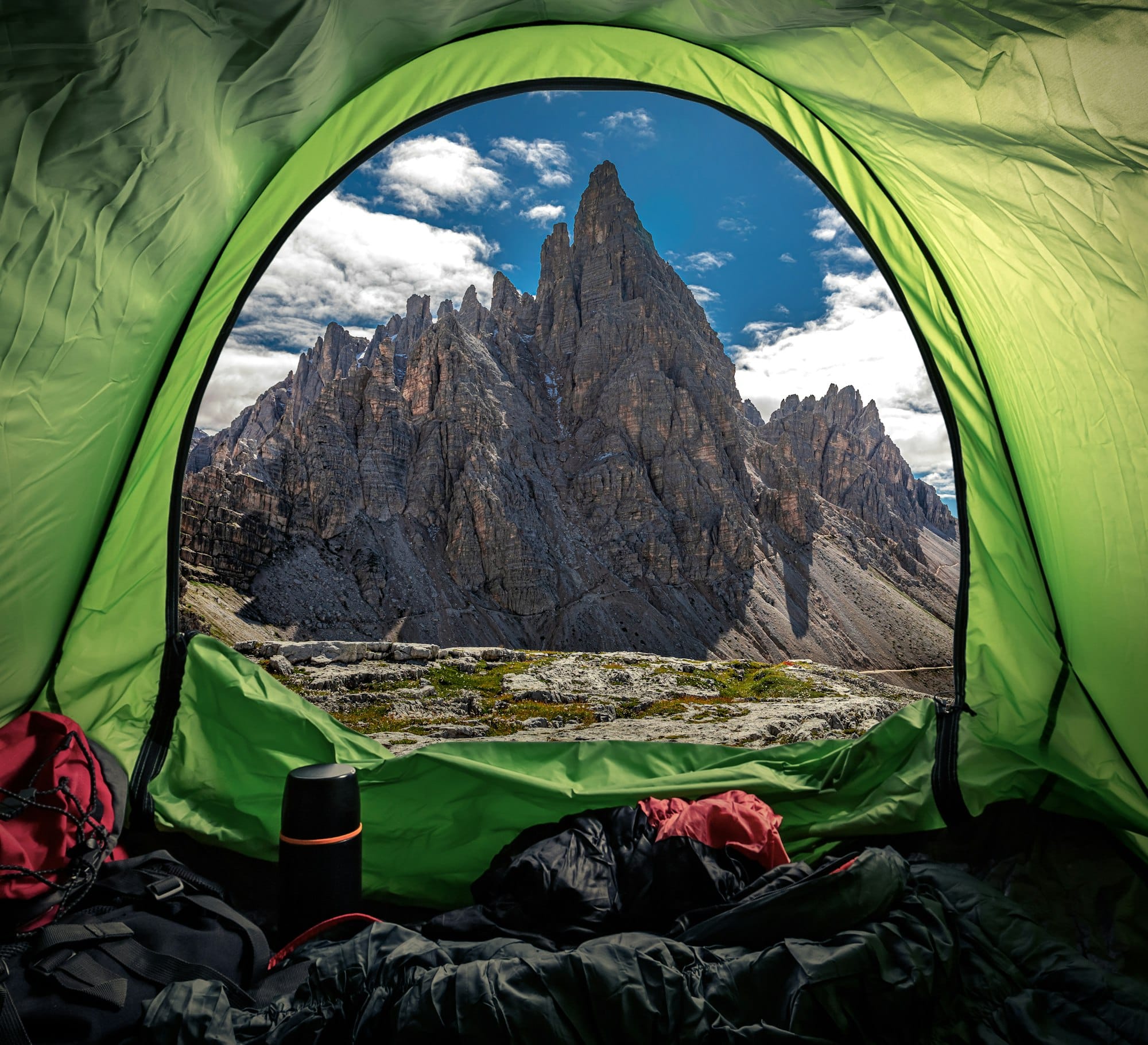 Camping in tent at Tre Cime in Dolomites, Italy