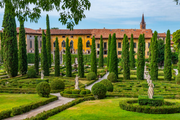 Formal Italian garden with sculptures and cypresses