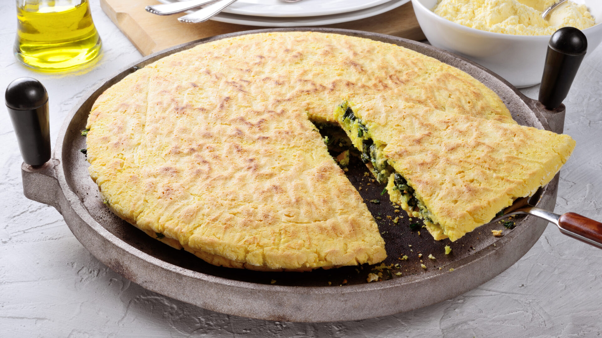 Pan-fried potato and spinach omelette.