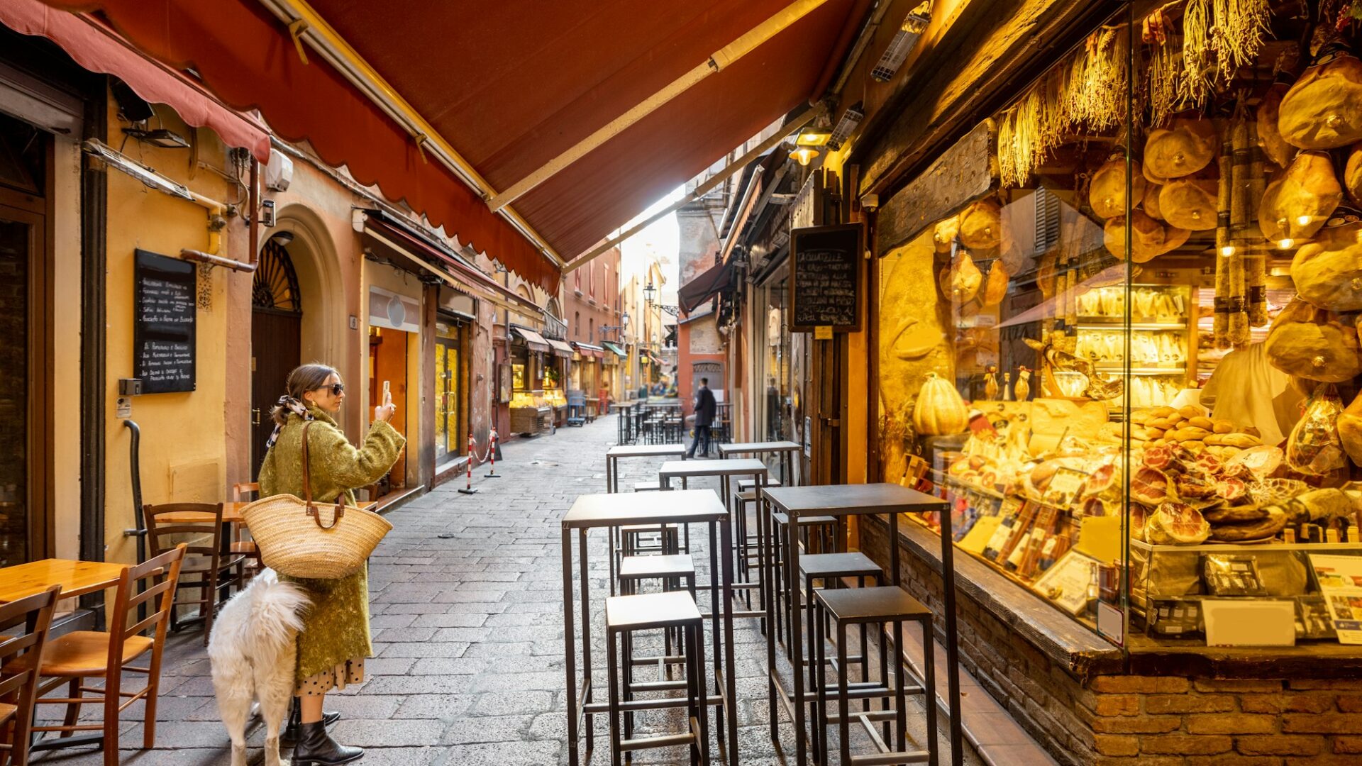 Famous gastronomical street with food stores in Bologna, Italy