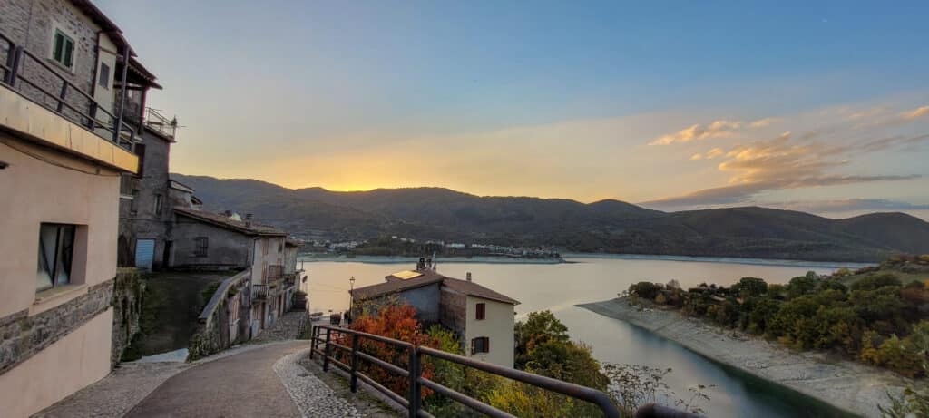Landscape at Lake Turano with buildings in Castel di Tora, province of Rieti, Lazio, Italy.